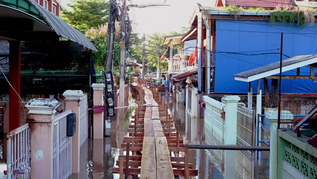 Flooding in community areas in Thailand,Water from the river flooded the house.