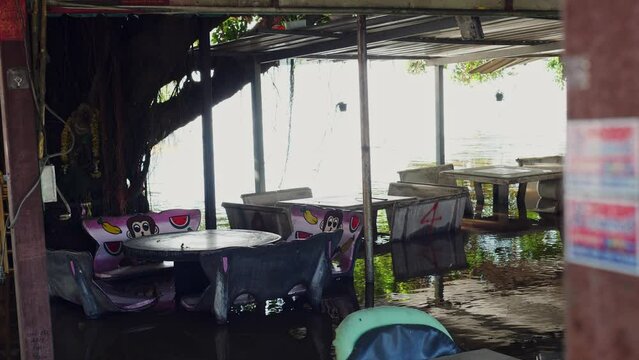 Flooding in community areas in Thailand,Water from the river flooded the house.