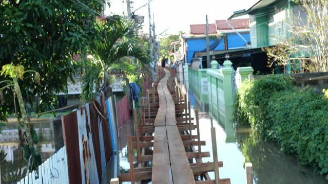 Flooding in community areas in Thailand,Water from the river flooded the house.