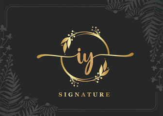 luxury gold signature initial iy logo design isolated leaf and flower