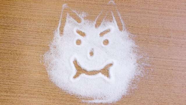 Bad face appears in the sugar pile