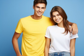 Fototapeta premium Studio photo of a happy couple in love against a plain colorful background - catching a moment of endearment