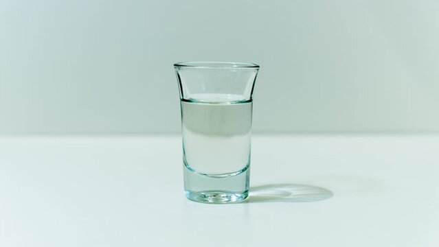 Shot fills with transparent liquid