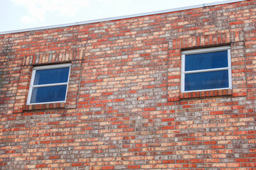 brick buildings symbolize stability and growth in real estate business. Offices that stand the test of time, securing success