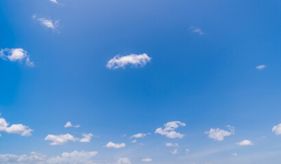  Panoramic view of clear blue sky and clouds, Blue sky background with tiny clouds. White fluffy clouds in the blue sky.