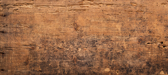 brown board as background. dark wood texture
