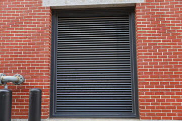 closed garage door symbolizes security, privacy, and hidden potential. The mundane facade conceals untold stories and aspirations