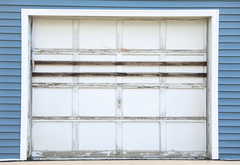 closed garage door symbolizes security, privacy, and hidden potential. The mundane facade conceals...