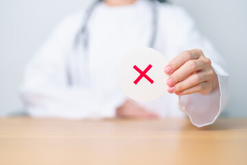 Doctor show Wrong symbol paper. True and false, accept and rejected, evaluation, Diagnosis, Vote,...