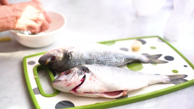 preparation of the stuffing for the sea bream