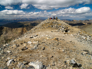 Group Of Climbers Atop a 14er Mountain in Colorado