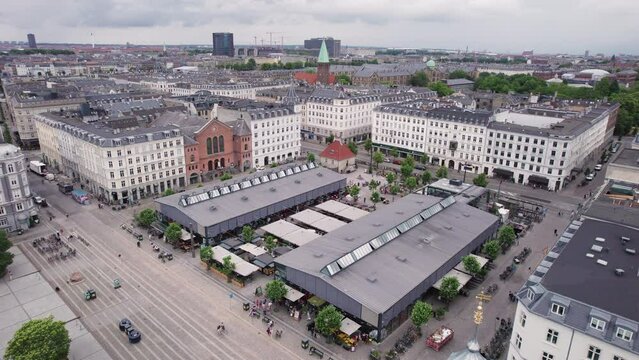 Torvehallerne is surrounded by the vibrant city life near N&oslash;rreport in central Copenhagen