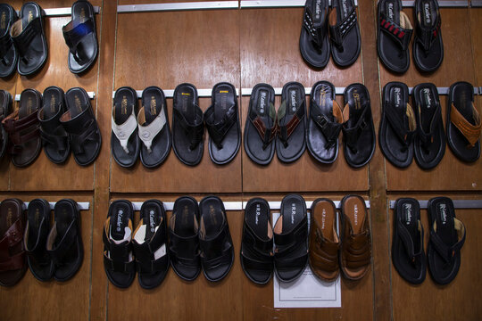 21th July 2023, Dhaka, Badda, notun bazar.   Lather Shoes Showcase  on retail Shop Shelves for sale in Bangladesh