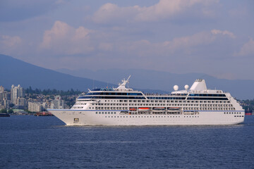 Luxury cruiseship cruise ship liner Regatta sail away departure from Vancouver, British Columbia to...