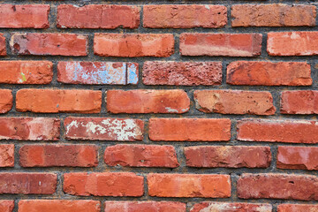 Horizontal red bricks on wall with fading color and blue and white splatter background asset