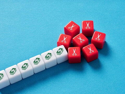 Budget cut concept. To cut spendings and reducing budget. Optimization of business costs.