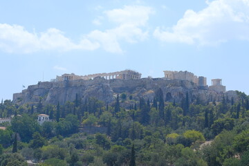 Fototapeta na wymiar Acropolis landmark on the top of a mountain in Athens, Greece