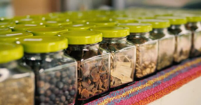 Various jars of seeds, 4k, slowmo