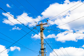 Power electric pole with line wire on colored background close up