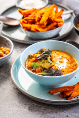 Homemade sweetpotato and carrot soup with chickpeas