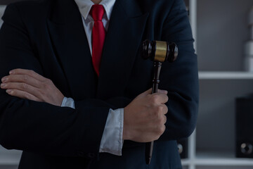 Close up of Male lawyers working at the law firms. Judge gavel with scales of justice. Legal law,...