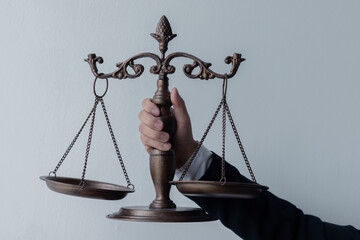 Close up of Male lawyers working at the law firms. Judge gavel with scales of justice. Legal law,...