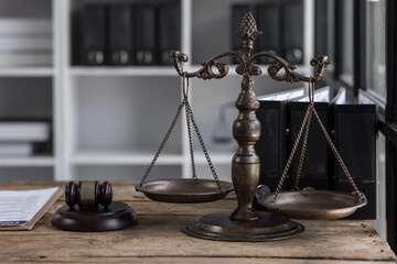 Legal and law. Statue of Lady Justice with scales of justice and wooden judge gavel on wooden table. Panoramic image statue of lady justice.lady justice. Law, legal concept
