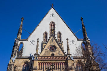 Fototapeta na wymiar Front facade of the historic Thomaskirche church in Leipzig, Germany