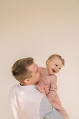 father with daughter having fun