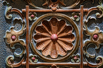Fototapeta na wymiar Closeup of ancient decorated furnace tile
