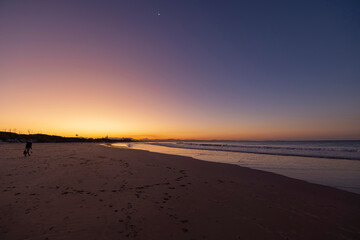 Sunset beach views across Main Beach in Byron Bay, New South Wales, Eastern Australia