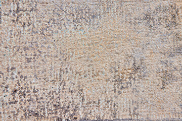 Bumpy texture of paper or concrete with scale like flakes of various earth tones background asset