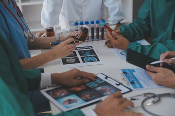 Medical technology network team meeting concept. Doctor hand working smart phone modern digital...