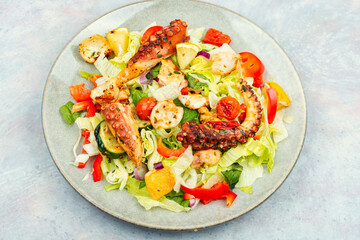 Octopus salad with raw vegetables.