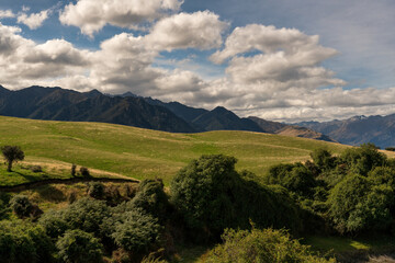 Agricultural rural farming fields and pasture on the shore of Lake Hawea