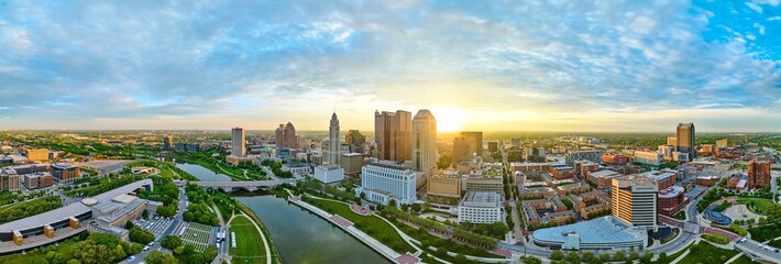 Panorama Columbus Ohio downtown at sunrise with river aerial drone shot