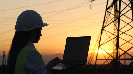 silhouette electrical engineer, work computer tablet sunset, electric tower, digital hand, electrical engineer reading tablet sunset, switching center, telecommunications electrician worker, business