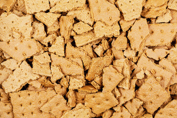 Flat lay of Crunched Graham Crackers make a delicious snack