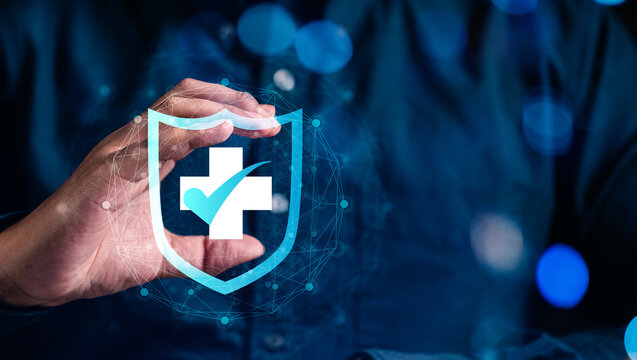 Health insurance, Medical technology and network concept. Businessman hand holding virtual medical health care symbol. Digital healthcare, network connection on hologram virtual screen.