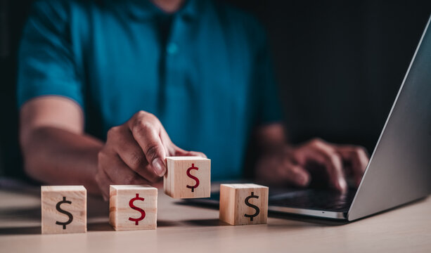 Finance and investment, financial and invest, growth, saving, wealth, investor, asset. Choosing wooden cube asset is growing to take benefit. Finance investment financial. Dollar symbol and arrow poin - Powered by Adobe