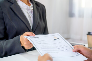 Office executives interviewing job applicants in the meeting room. employer conversation summary work employment