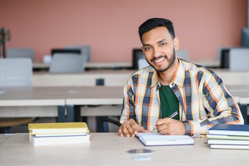 Handsome and young indian Male college student.