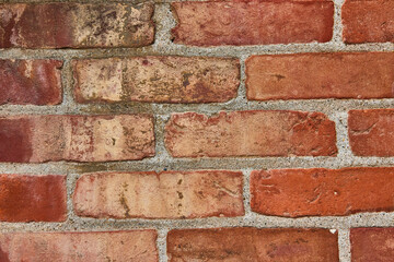 Dirty and grimy with green gunk on red brick wall horizontal background asset