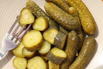 Tasty canned food concept, canned cucumbers, food for winter