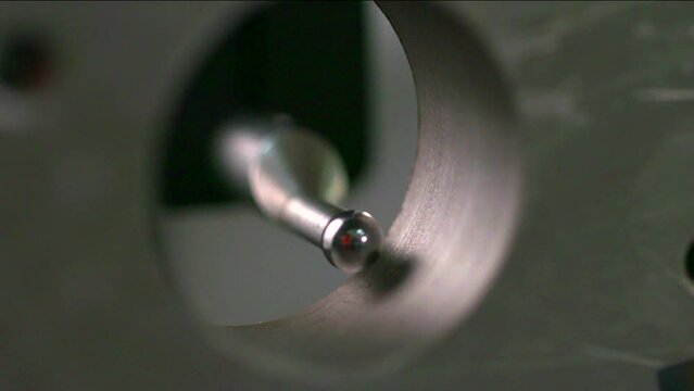 Close up automatic coordinate measurement machine (CMM) for inspection high precision part during working