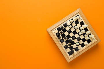 Chess on color background, top view