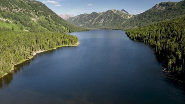 An aerial view of Lake Rakhmanovskoe. The lake is located at an altitude of 1760 meters above sea level on the territory of the Katon-Karagay natural park in Kazakhstan.