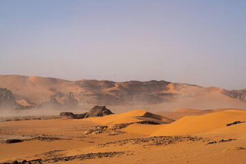 view in the Sahara desert of Tadrart rouge tassili najer in Djanet City  ,Algeria.colorful orange sand, rocky mountains