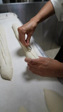 The process of preparing baguette dough in the artisan bakery.