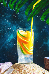 Fresh summer cocktail with lime and oranges.